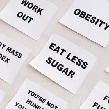 Collection of motivational notes promoting health and wellness found on paper notes.